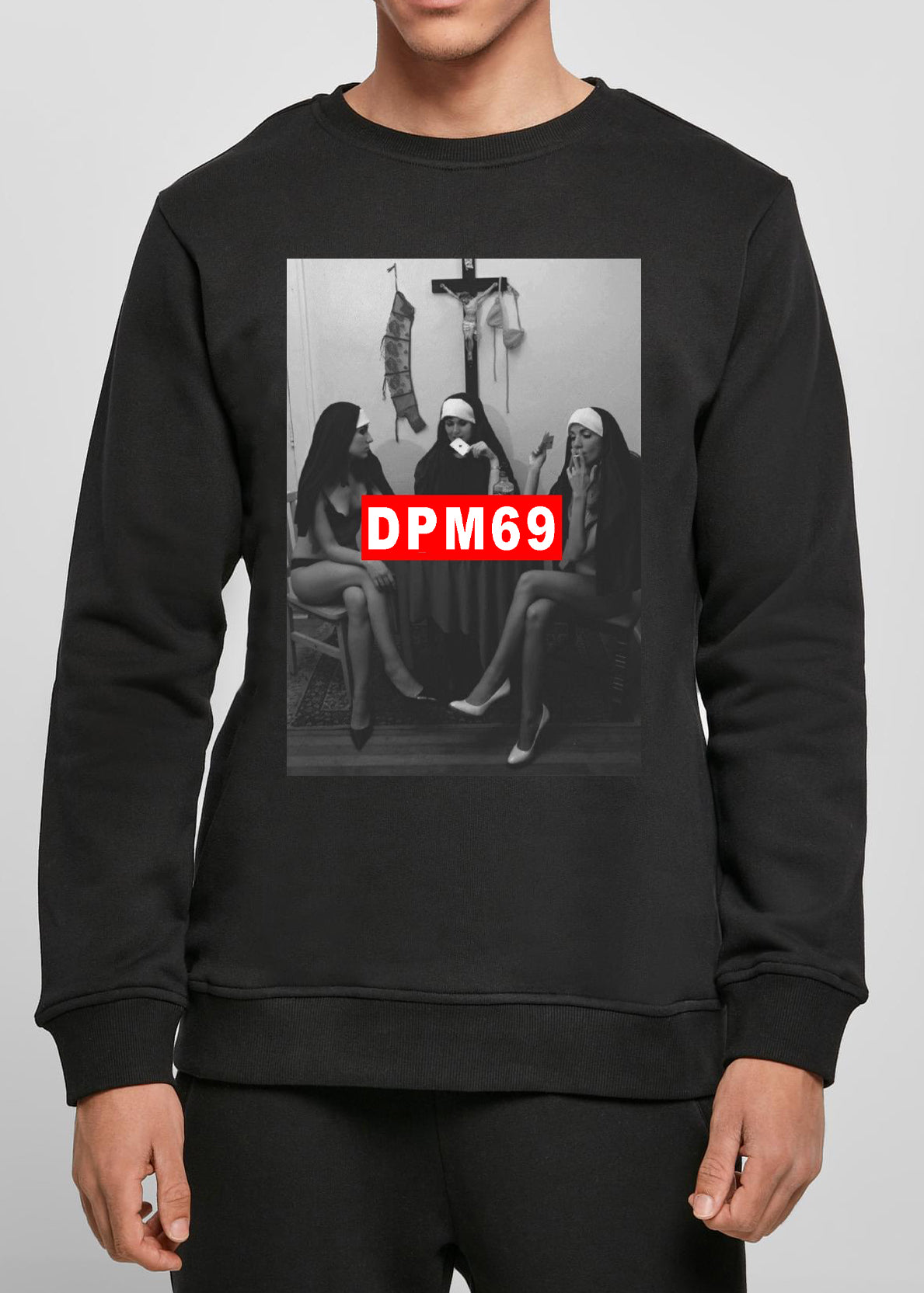 Men's black sweatshirt featuring unique handmade prints and DPM69 logo, showcasing trendy urban fashion.
