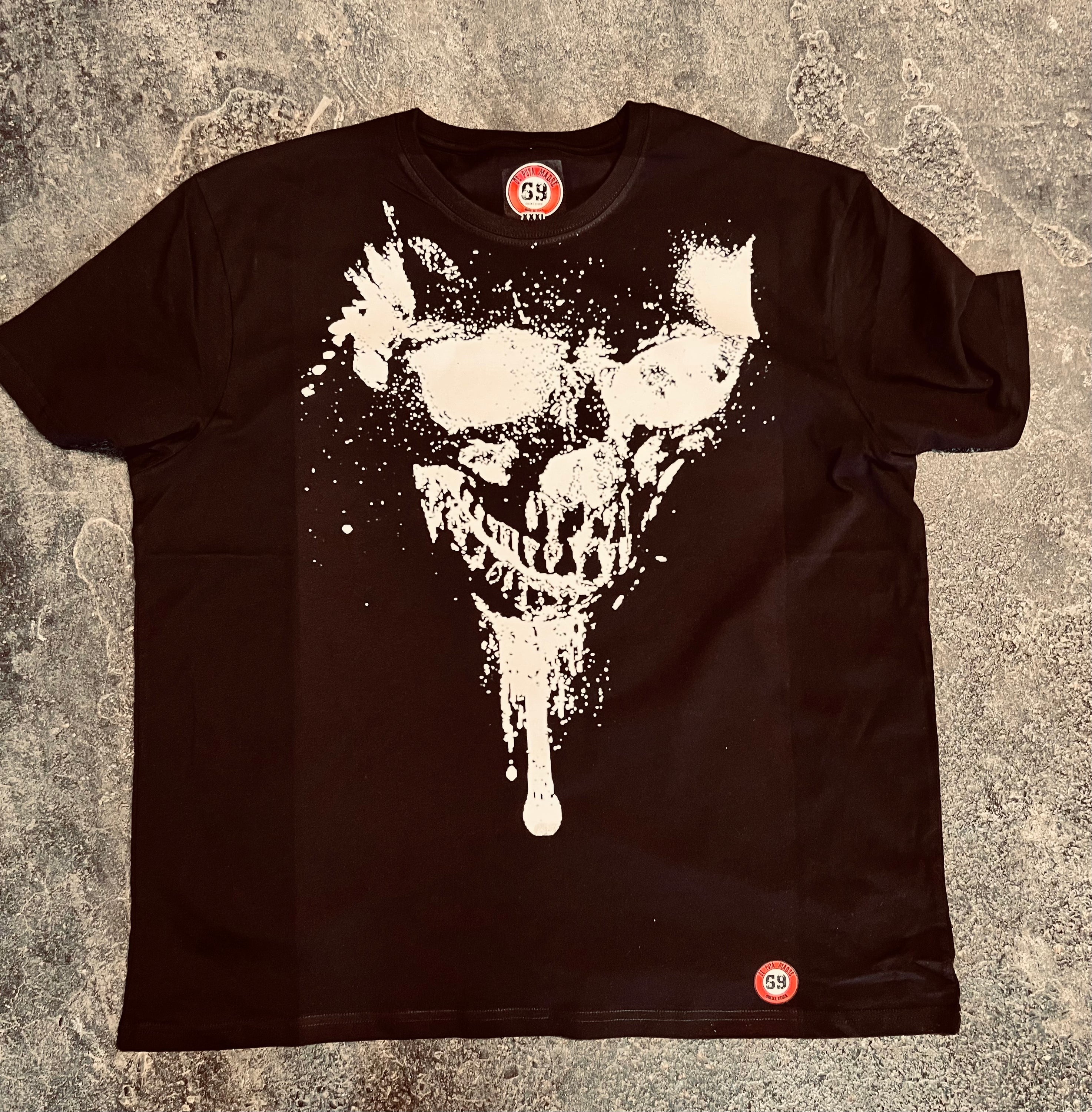 Black men's t-shirt featuring a striking skull print on the front and back, made from breathable jersey cotton.