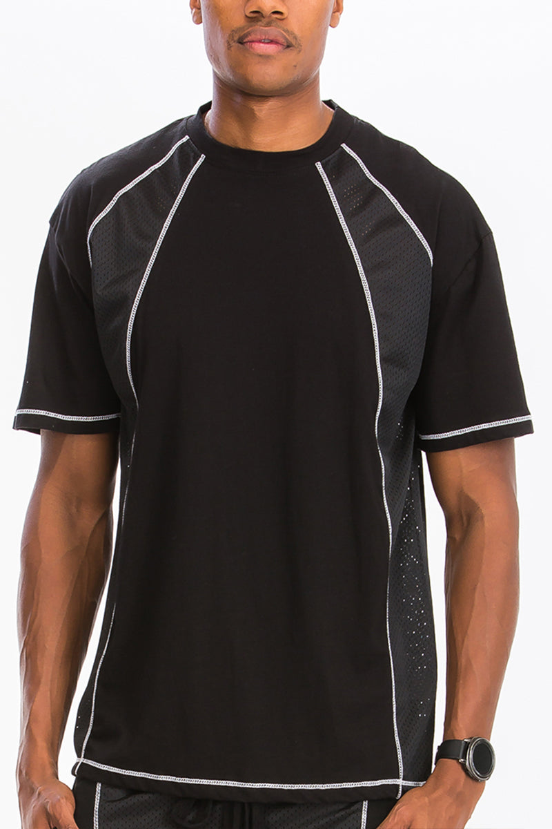 A stylish MESH WHITE STITCH SHIRT featuring white contrast stitching, made from a comfortable polyester-spandex blend.