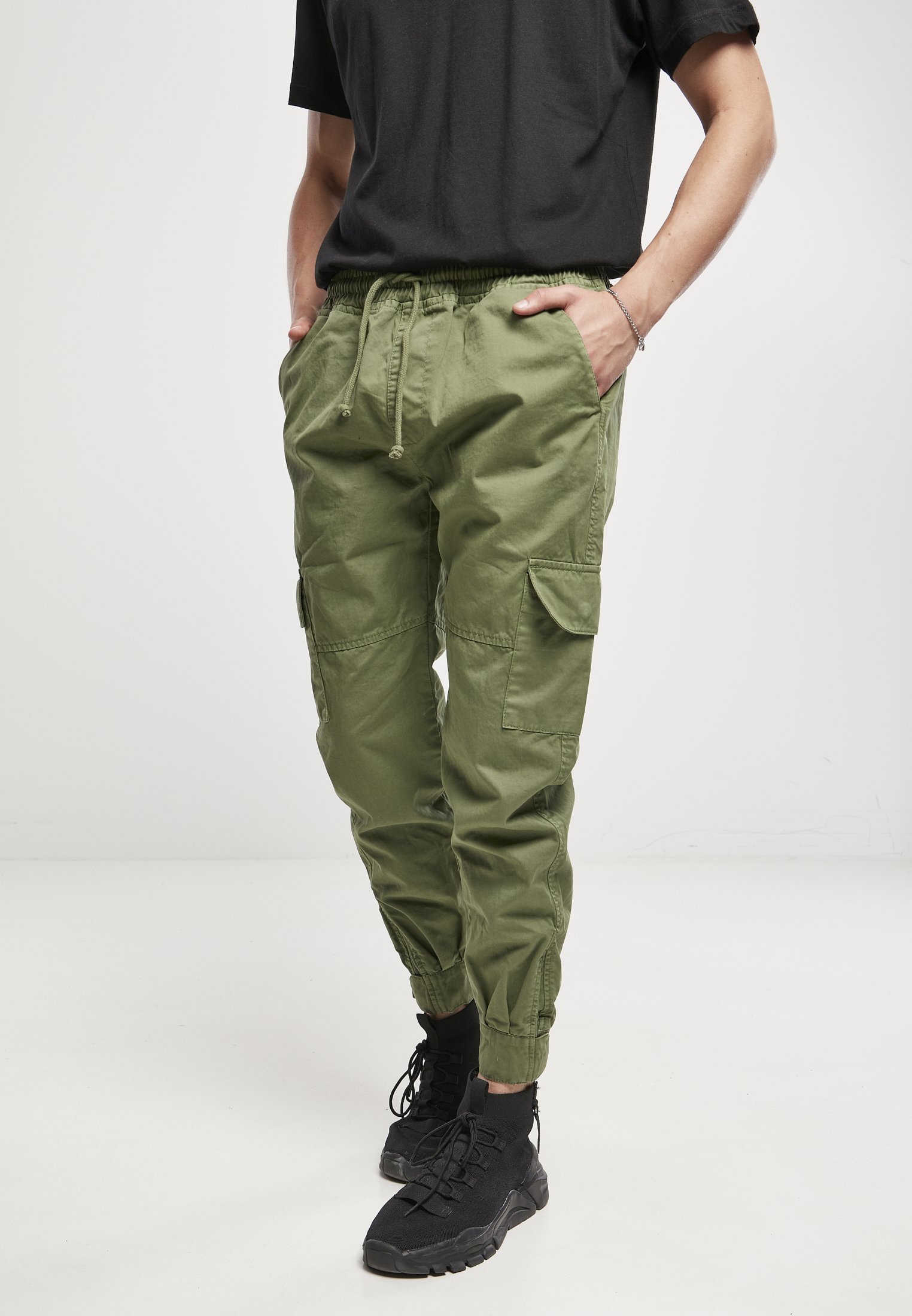 Men's Military Jog Pants made from durable cotton twill, featuring cargo pockets and adjustable waistband.