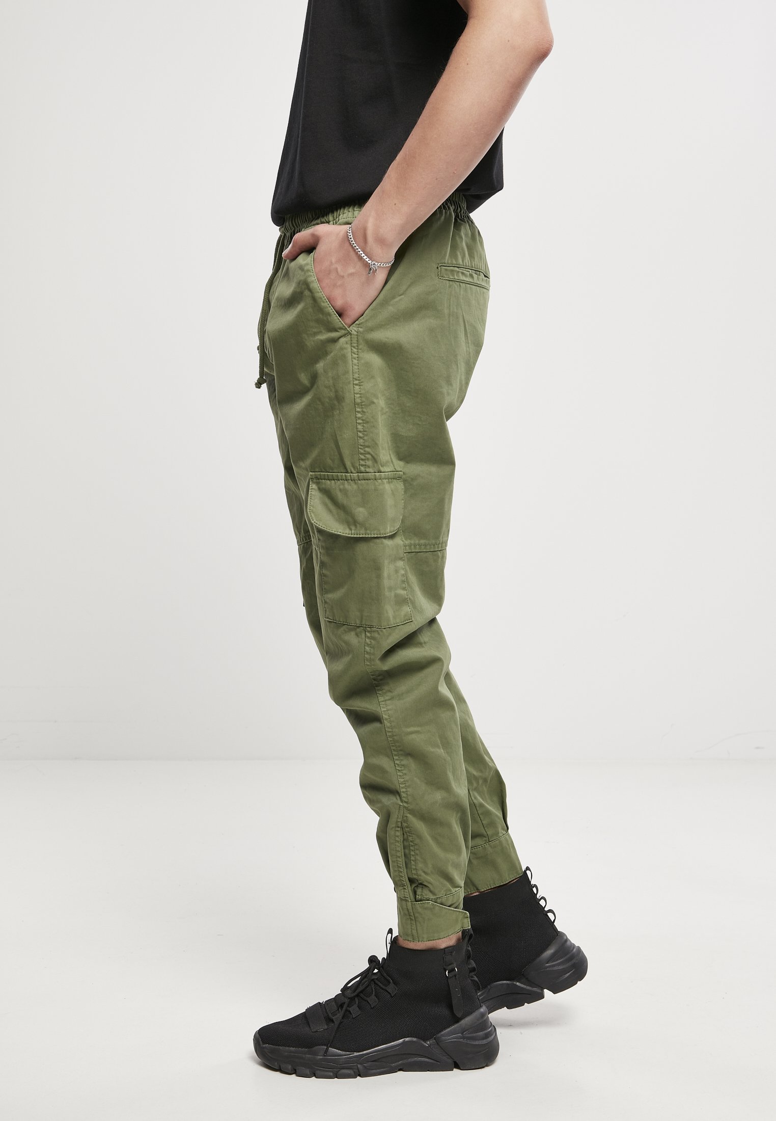 Men's Military Jog Pants made from durable cotton twill, featuring cargo pockets and adjustable waistband.