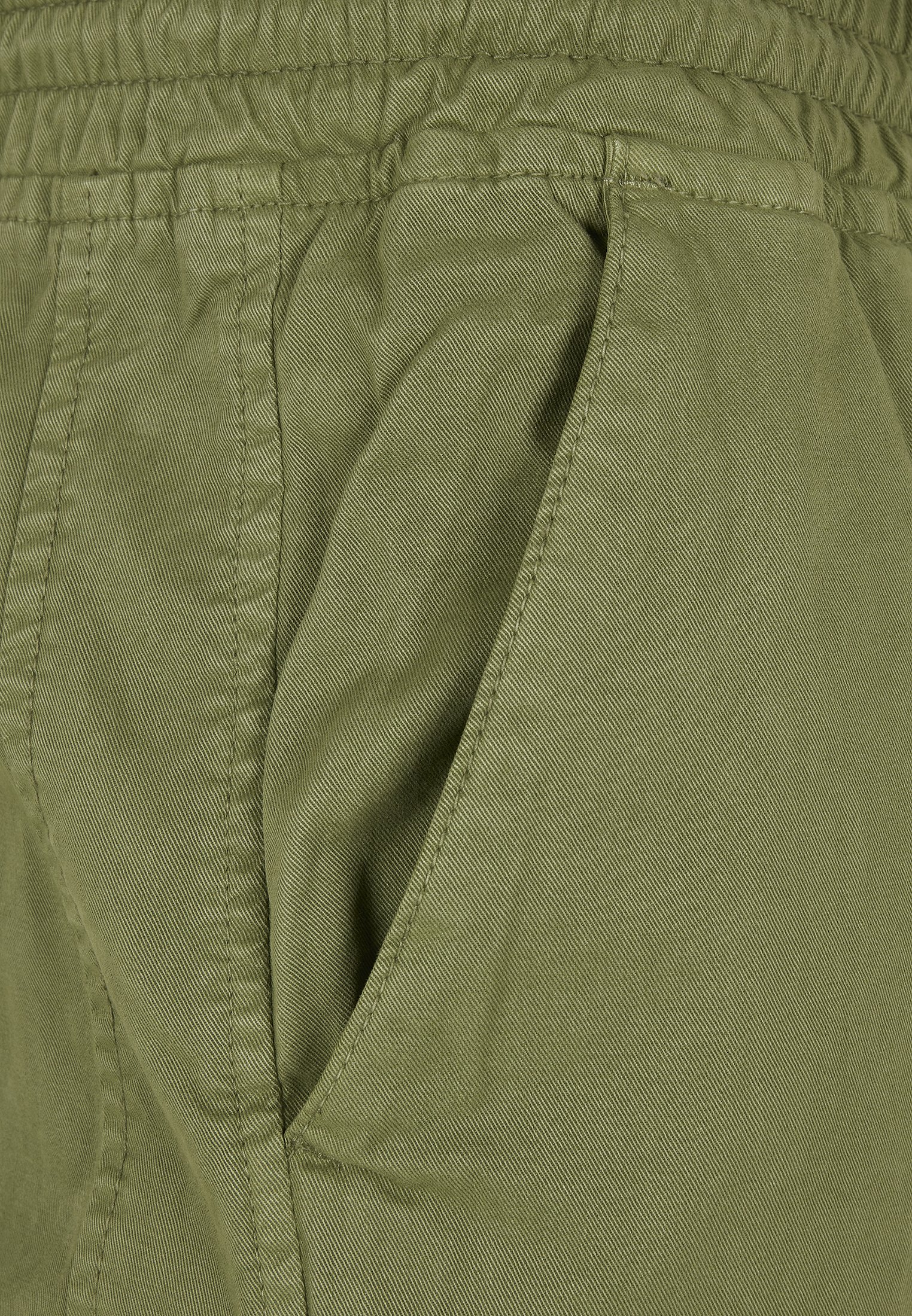 Men's Military Jog Pants made from durable cotton twill, featuring cargo pockets and adjustable waistband.