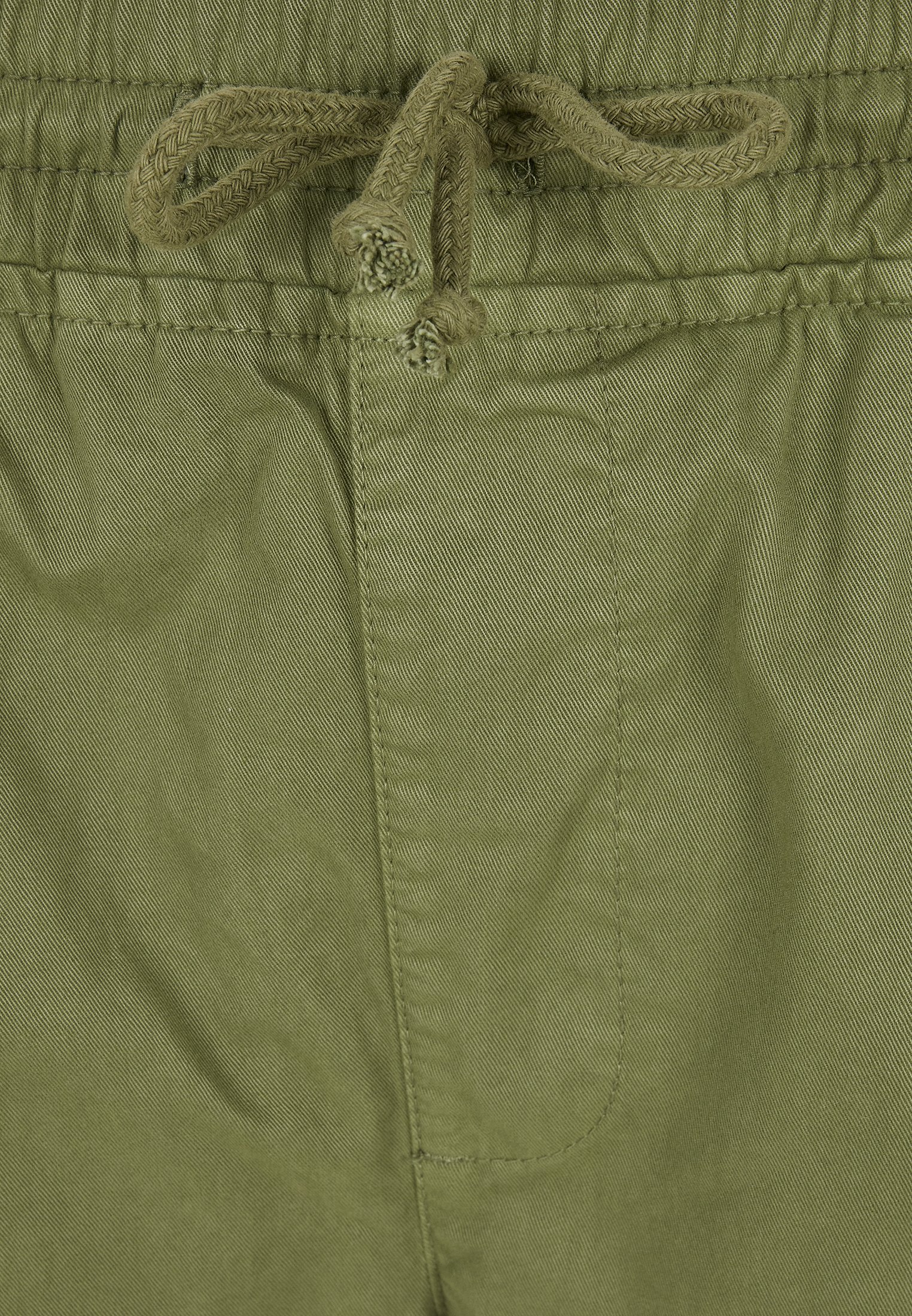 Men's Military Jog Pants made from durable cotton twill, featuring cargo pockets and adjustable waistband.