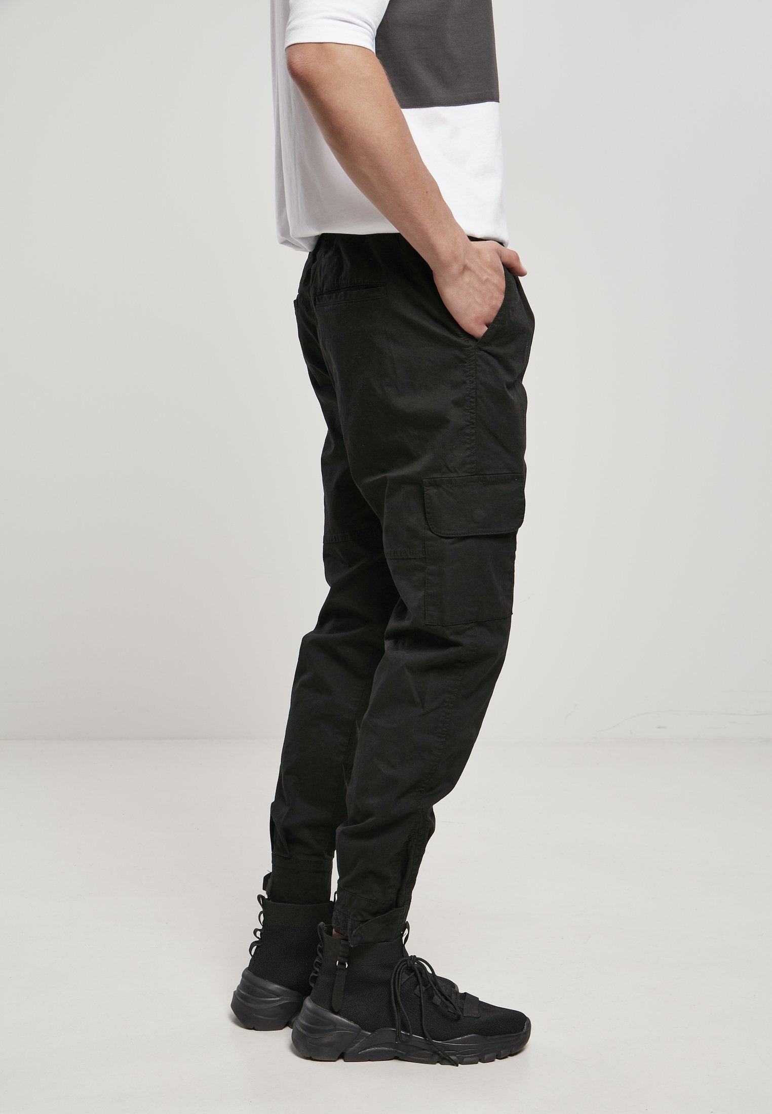 Men's Military Jog Pants made from durable cotton twill, featuring cargo pockets and adjustable waistband.