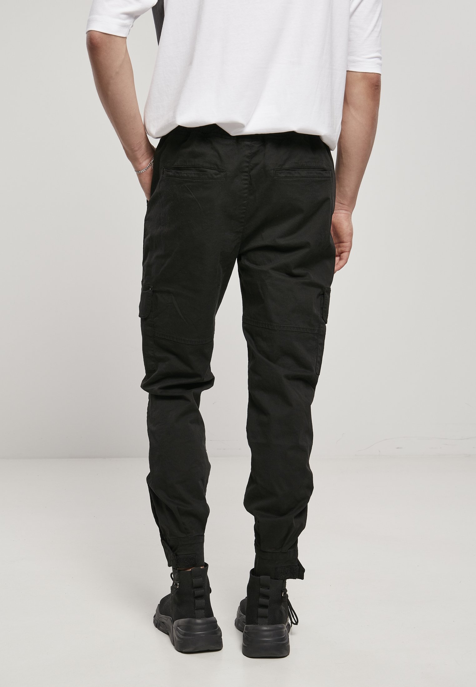 Men's Military Jog Pants made from durable cotton twill, featuring cargo pockets and adjustable waistband.