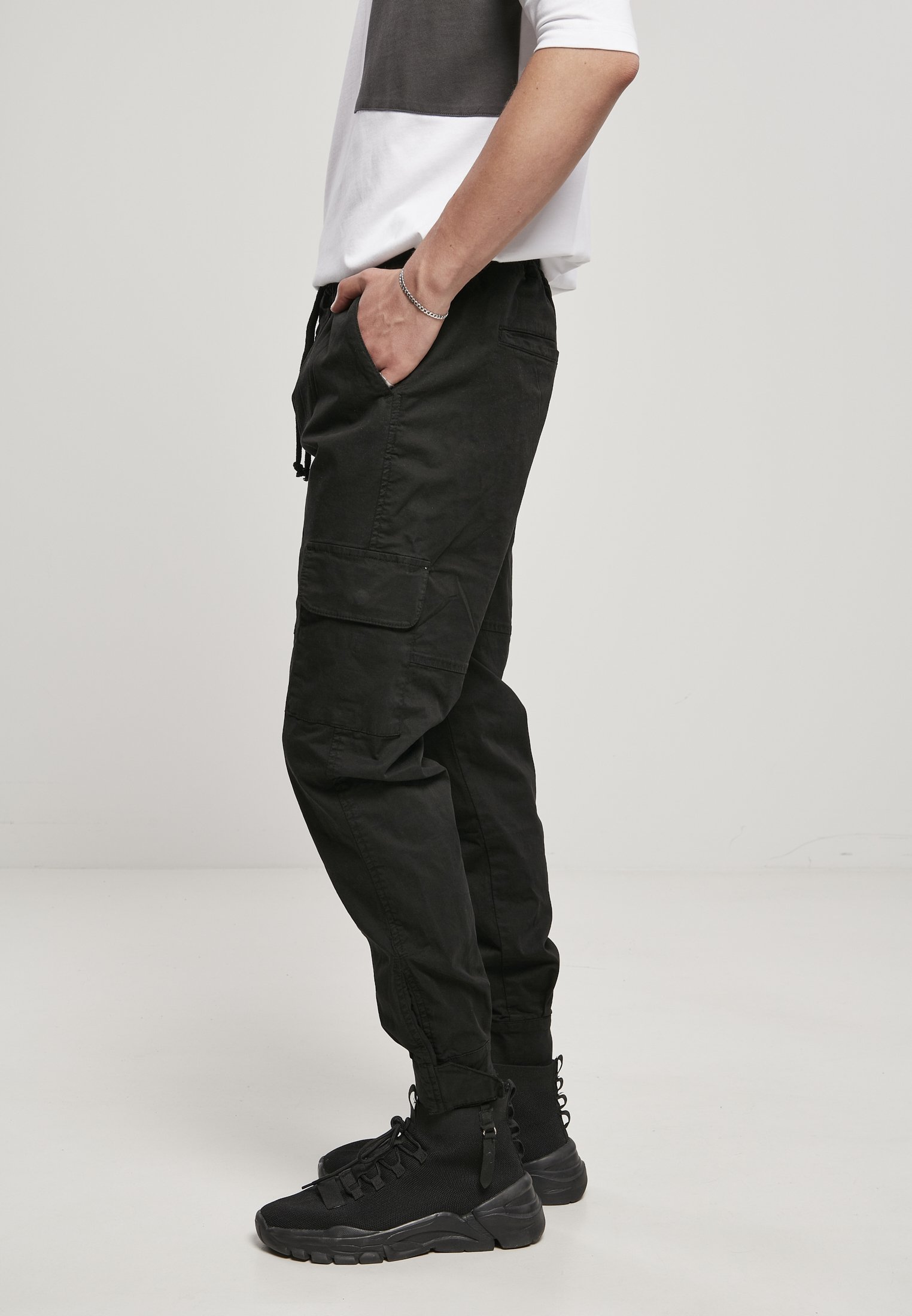 Men's Military Jog Pants made from durable cotton twill, featuring cargo pockets and adjustable waistband.