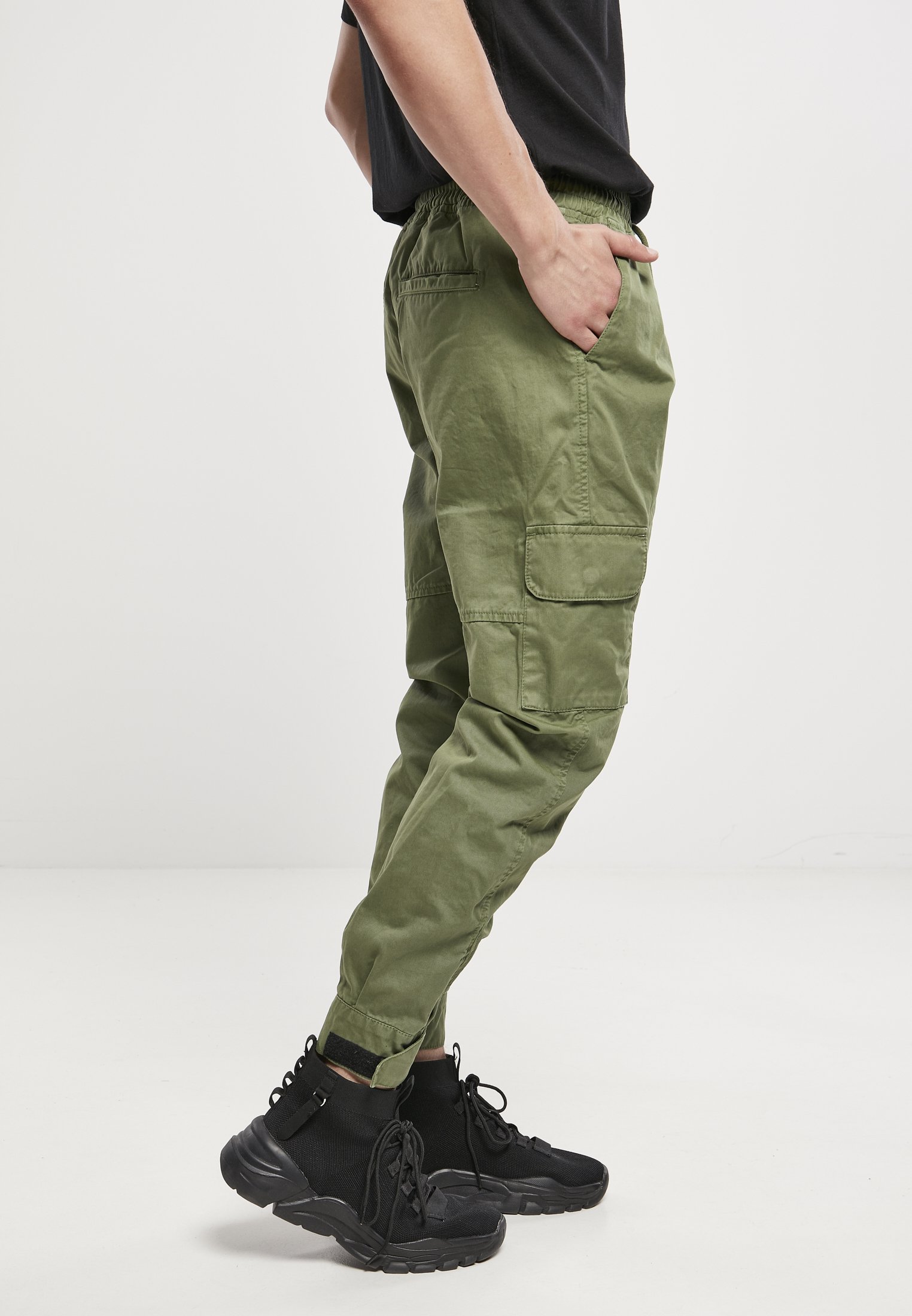Men's Military Jog Pants made from durable cotton twill, featuring cargo pockets and adjustable waistband.