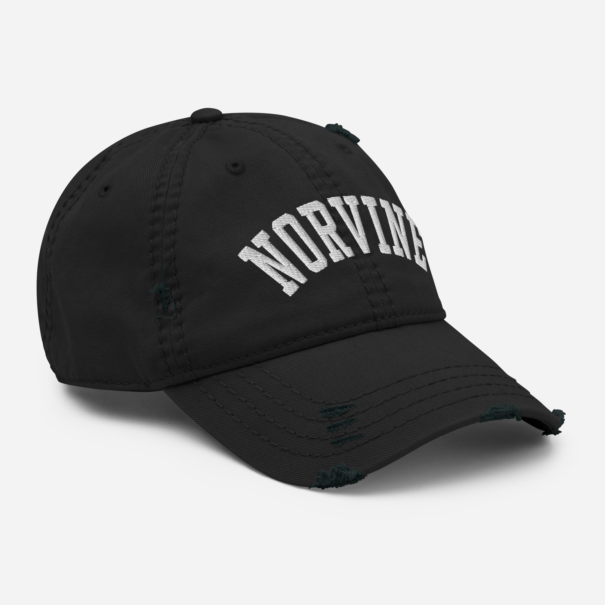 Norvine Distressed Cap featuring a slightly distressed brim and crown, made from soft cotton twill with an adjustable closure.