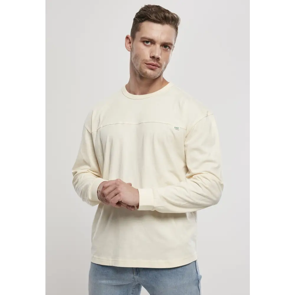Men's Organic Cotton Short Curved Oversized Longsleeve in a casual style with wide cuffs and a stepped round neckline.
