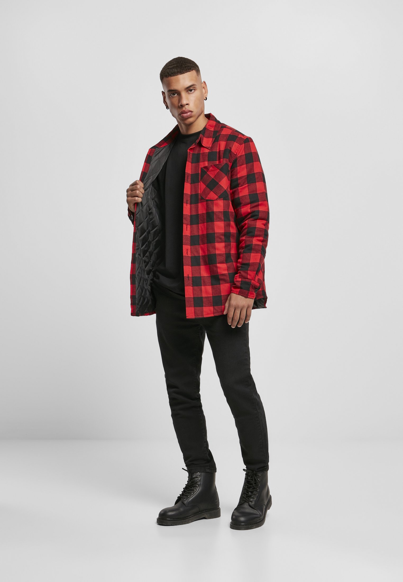 A stylish Padded Check Flannel Shirt featuring a classic check pattern, made from soft cotton flannel with a warm polyester lining.