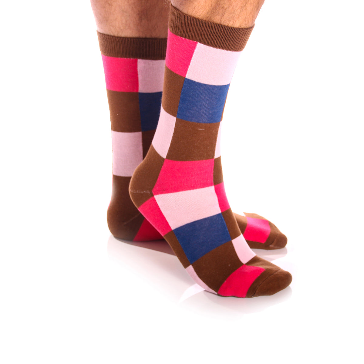 A pair of colorful mens crew socks featuring a pink, brown, and blue square pattern, made from premium cotton for comfort and style.