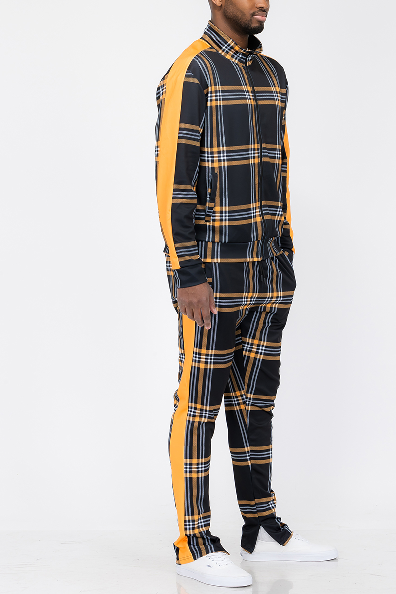 Plaid Track Jacket and Pant Set displayed on a mannequin, featuring a full zip jacket and elastic waist pants with ankle zippers.