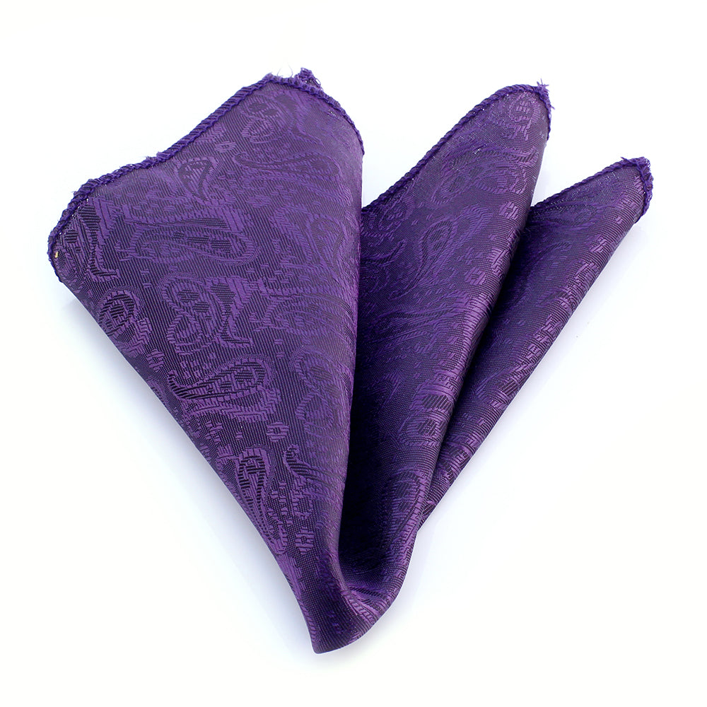 Purple Solid Paisley Men's Pocket Square made from premium silk, featuring a classic paisley design, elegantly folded and displayed.