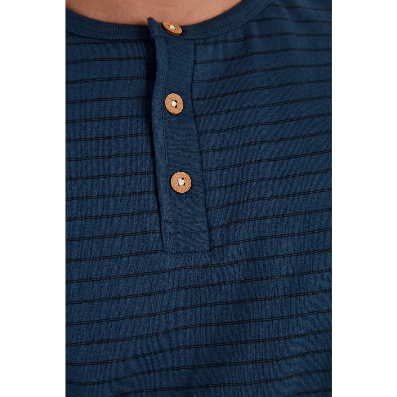 Rafael Striped Henley featuring navy yarn dye stripes and three-button placket, made from 98% cotton and 2% polyester.