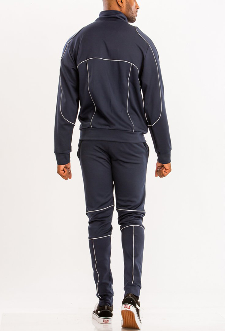 Reflective Piping Detailed Track Suit featuring a full zip jacket, elastic waist, and standard pockets, made from polyester and spandex.