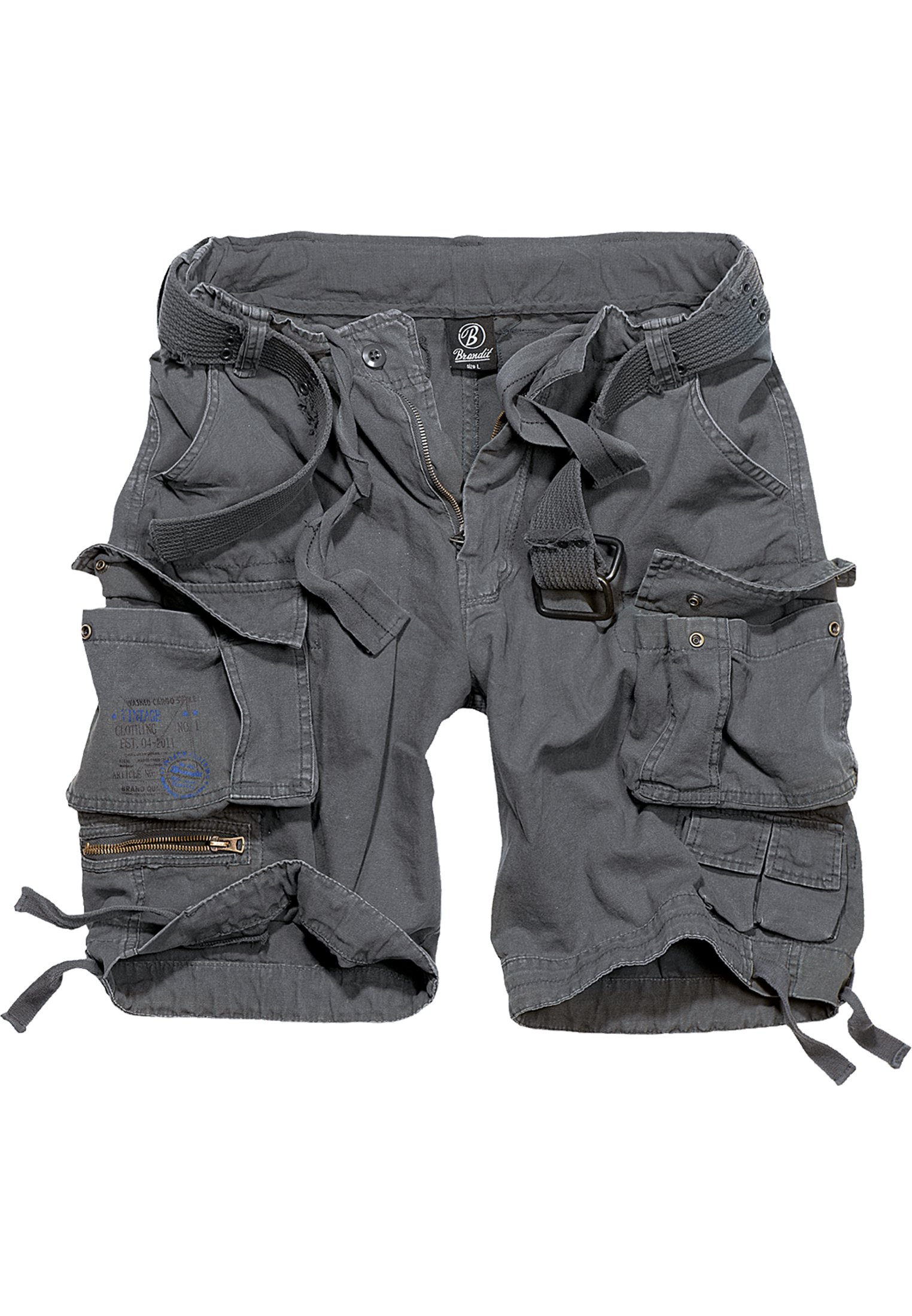 Savage Vintage Cargo Shorts in a rugged outdoor setting, showcasing large side pockets and decorative belt with eyelets.