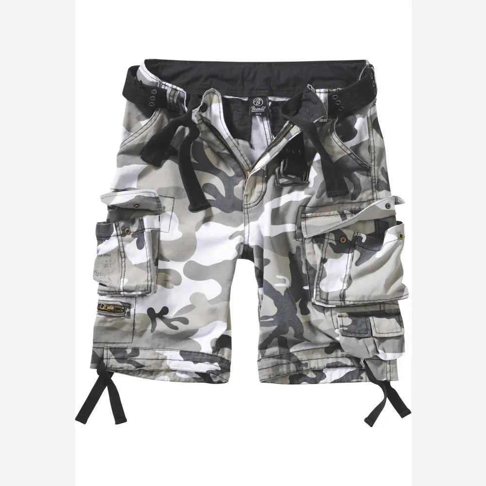 Savage Vintage Cargo Shorts in a rugged outdoor setting, showcasing large side pockets and decorative belt with eyelets.