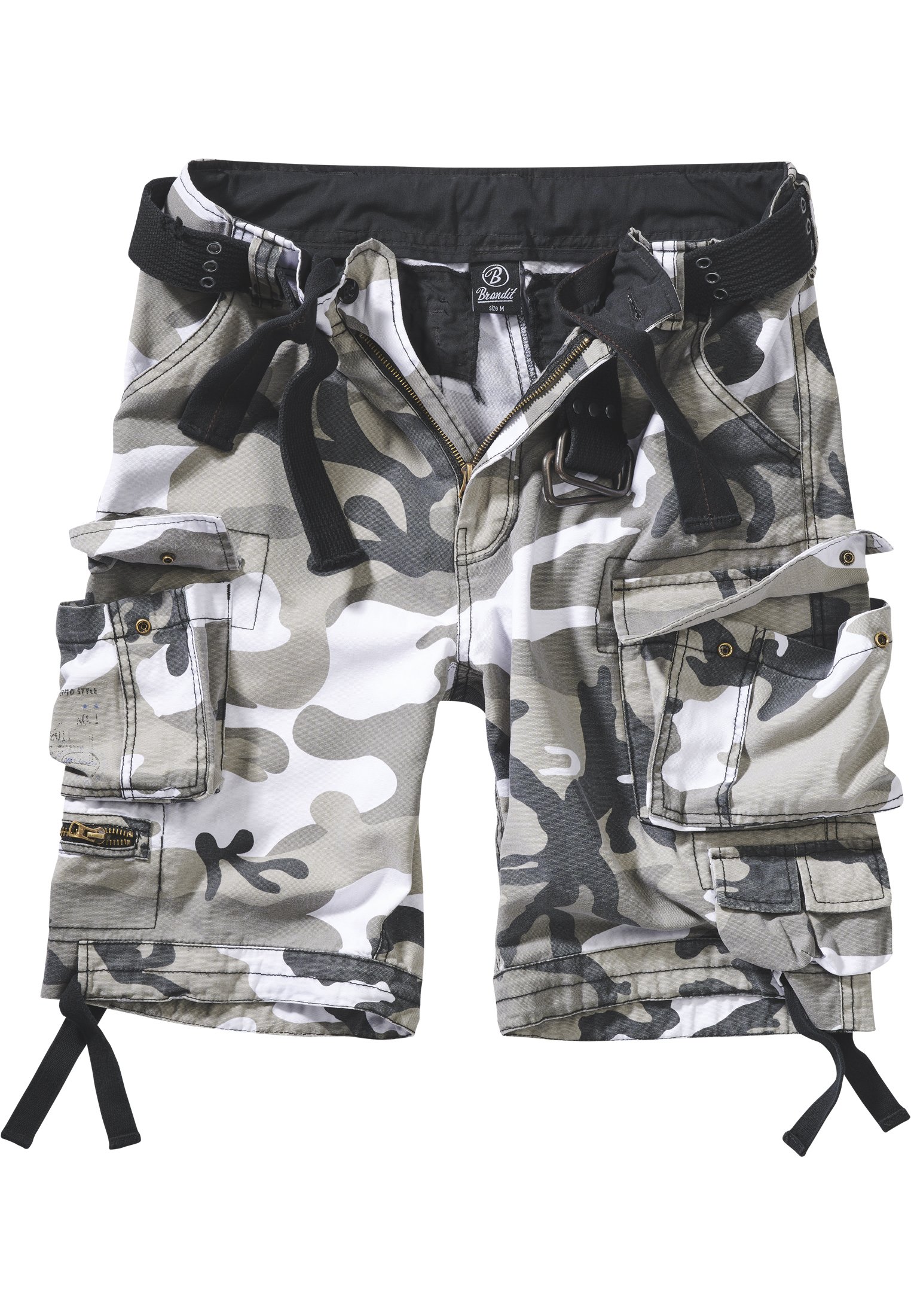 Savage Vintage Cargo Shorts in a rugged outdoor setting, showcasing large side pockets and decorative belt with eyelets.