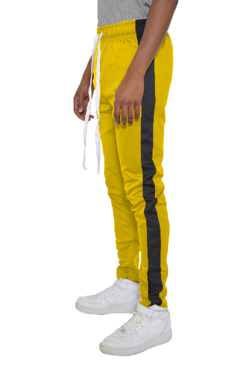 A pair of stylish slim fit track pants featuring a single stripe detail and hidden ankle zipper, perfect for workouts and casual wear.