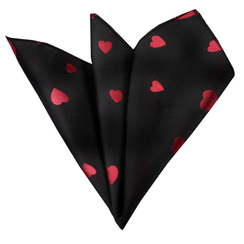 Solid black pocket square with red hearts, made from premium silk, elegantly folded and displayed.