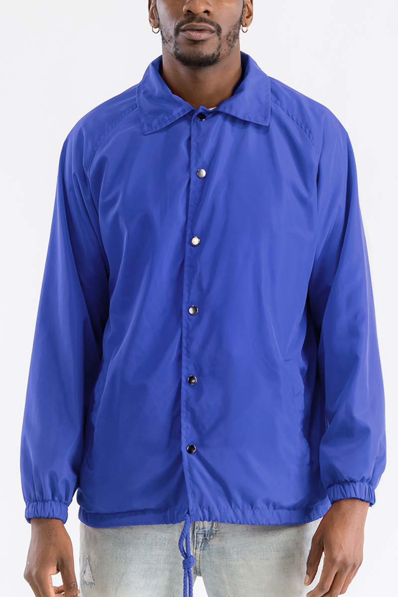 Solid Coachs Jacket in a stylish design, featuring a snap button closure and weather-resistant shell, perfect for casual and outdoor wear.