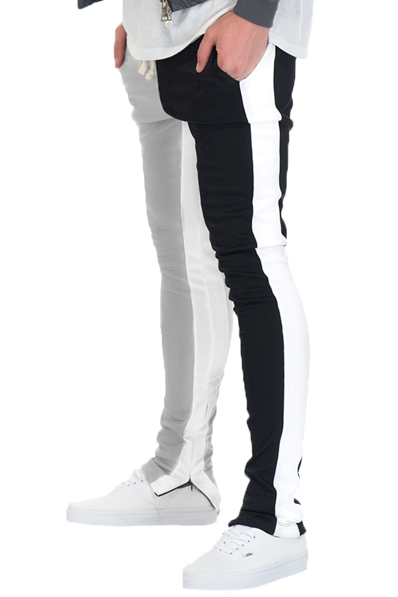 A pair of stylish Split Tone Track Pants featuring a two-tone design with a single side stripe and ankle zippers, perfect for casual wear.