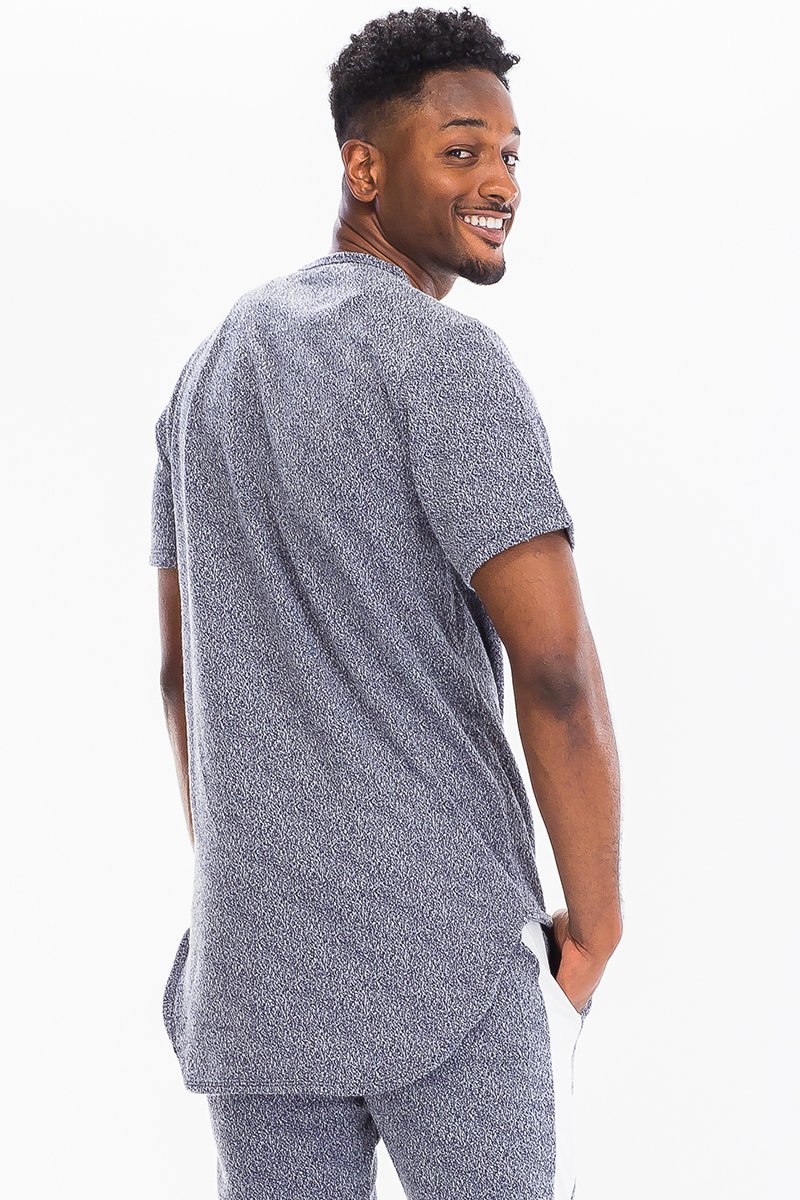 A stylish STATIC SHOCK TSHIRT made from a comfortable polyester and spandex blend, featuring a unique static textured design.