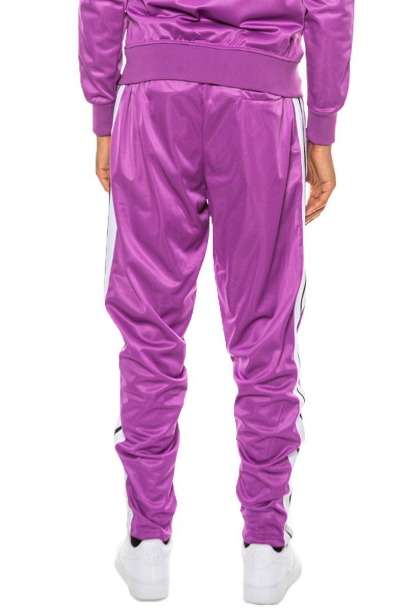 A pair of stylish striped tape track pants made from 100% polyester, featuring an elastic waist, drawstring, ankle zippers, and multiple pockets.