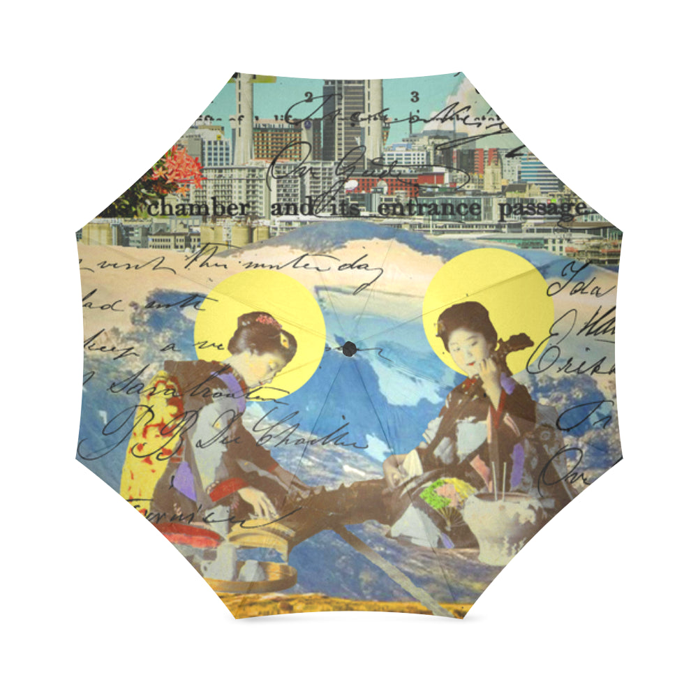 THE CONCERT II Foldable Umbrella showcasing vibrant prints and a sleek design, perfect for rainy days.