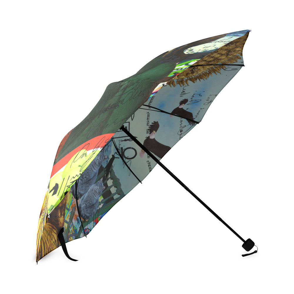 THE EMPEROR OF SNOWY MOUNTAIN foldable umbrella showcasing vibrant prints and a sturdy aluminum frame, perfect for rainy days.