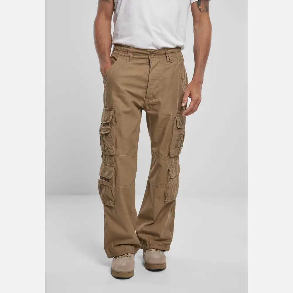 A pair of Vintage Cargo Pants in various colors, featuring spacious side pockets and adjustable drawstrings at the leg ends.