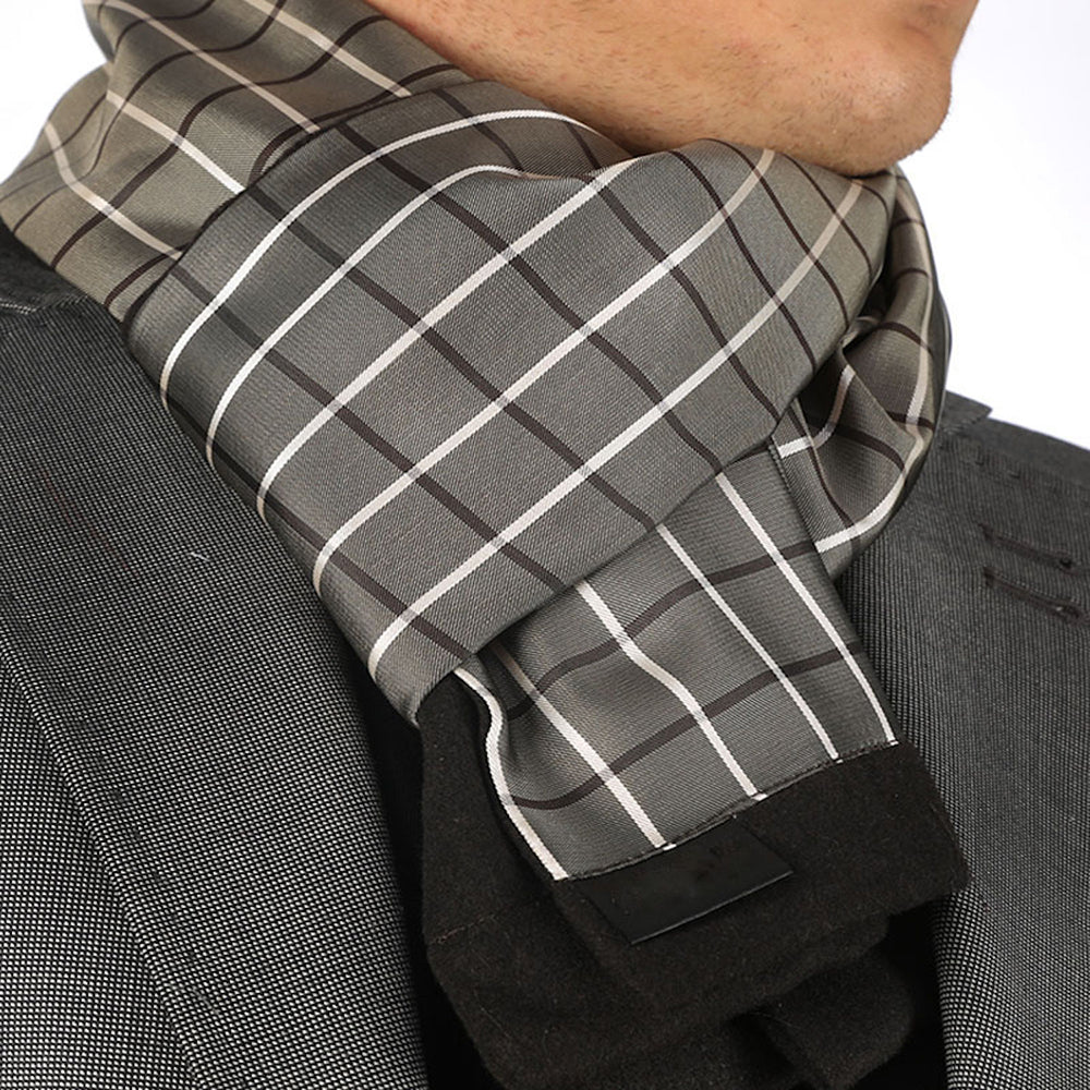 A luxurious White Squares Mens Silk Scarf featuring a stylish black, white, and red plaid design, made from premium silk and suede.