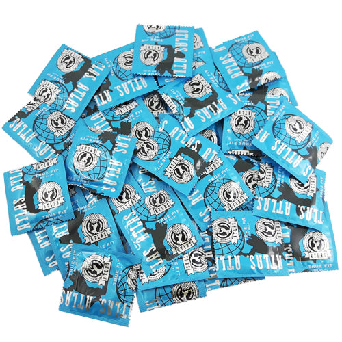Atlas True Fit condoms in packaging, showcasing their contoured shape and natural rubber latex material.