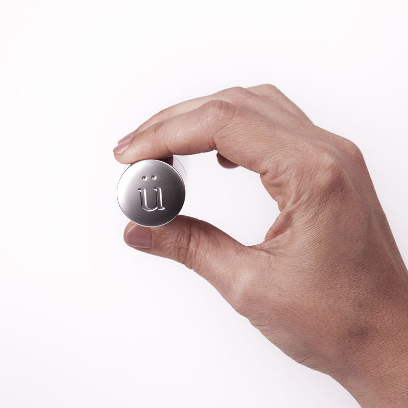 Elegant überlube Silver Refillable case with 15ml insert, designed for discreet travel and enhanced intimacy.