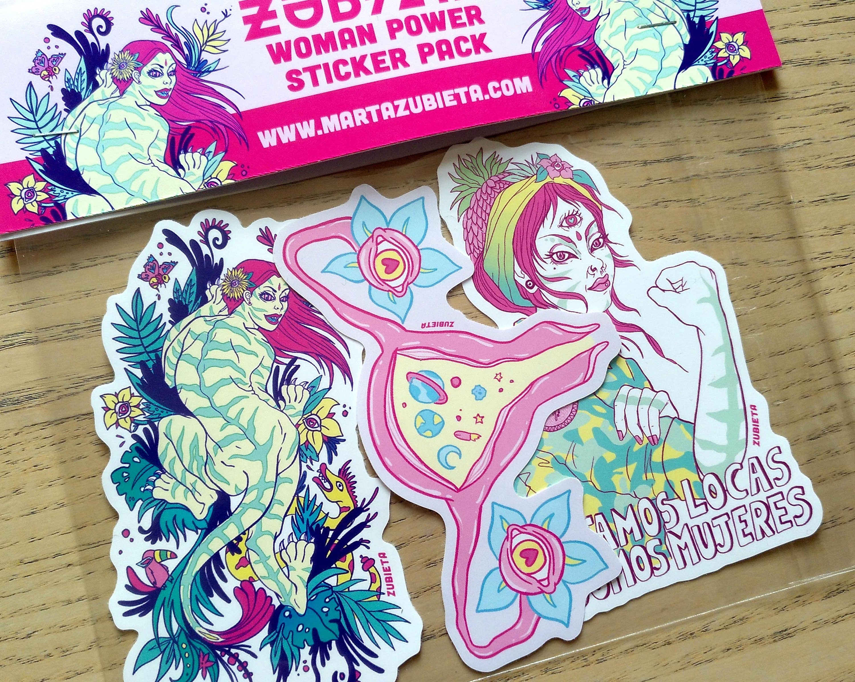 A vibrant Cosmic Uterus Sticker featuring intricate designs, perfect for personalizing laptops, notebooks, and cars.