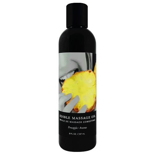 Bottle of Earthly Body Pineapple Edible Massage Oil with a tropical design, showcasing its natural ingredients and pineapple flavor.