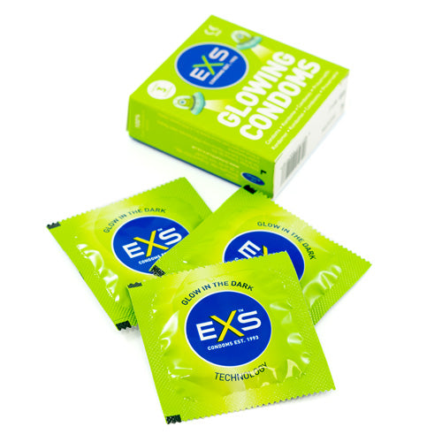 EXS Glow Box 3 condoms glowing in the dark, showcasing their classic shape and high-quality natural rubber latex material.