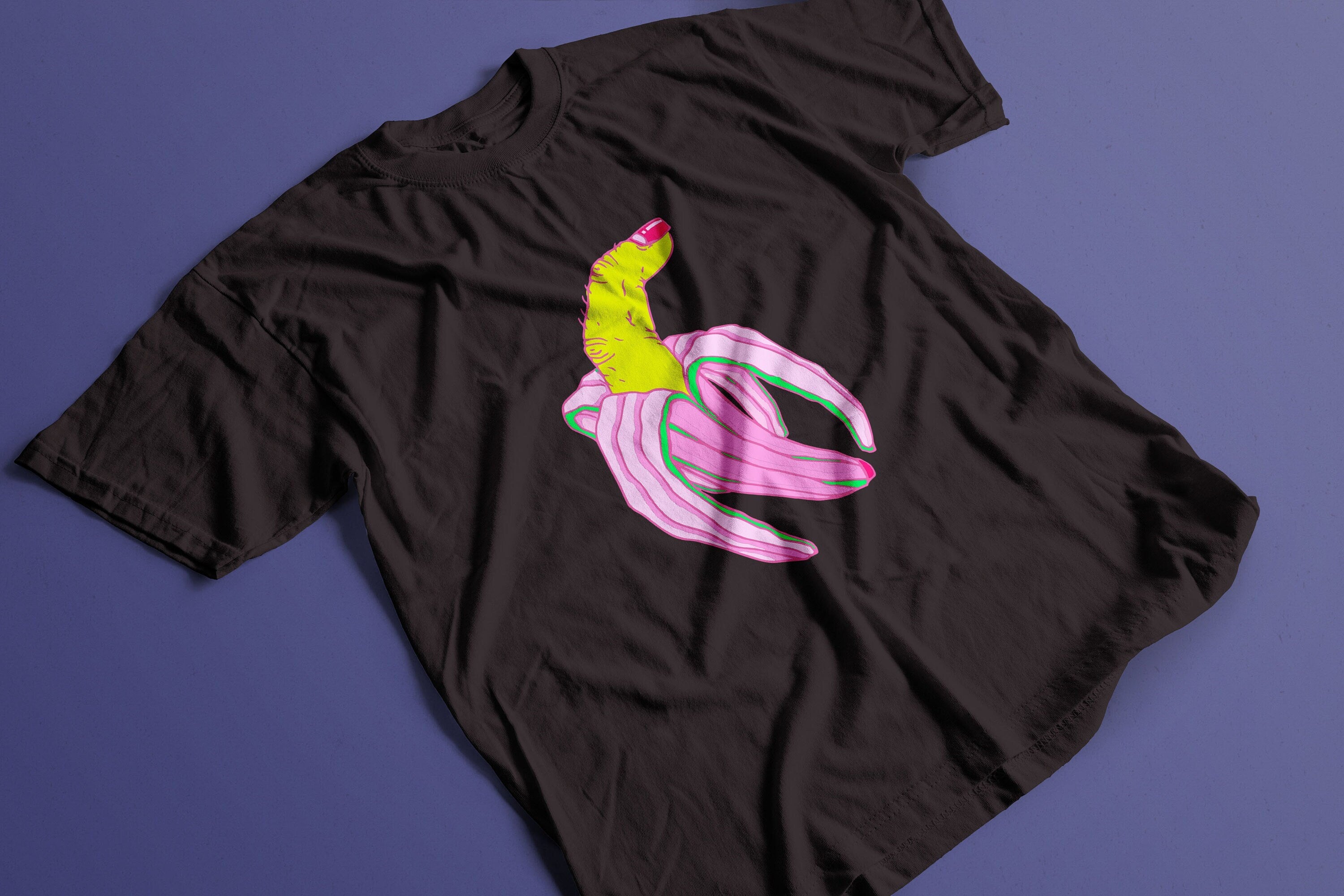 Finger Banana T-shirt featuring the Bananarama 7000 design, made from 100% organic cotton, displayed on a model.