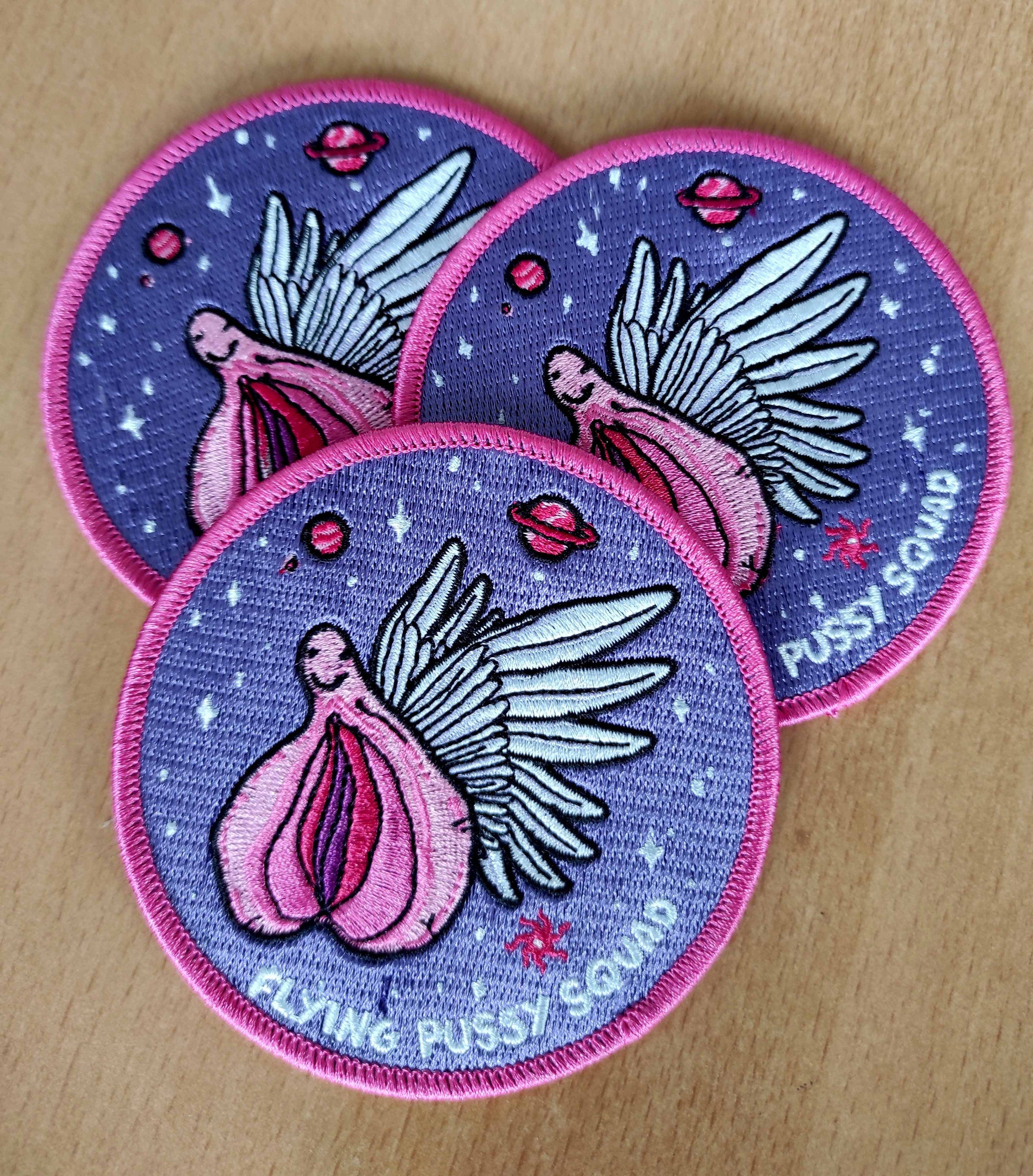 Flying Pussy Squad Embroidered Patch featuring psychedelic design in six colors, measuring 12.5cm x 12.5cm.
