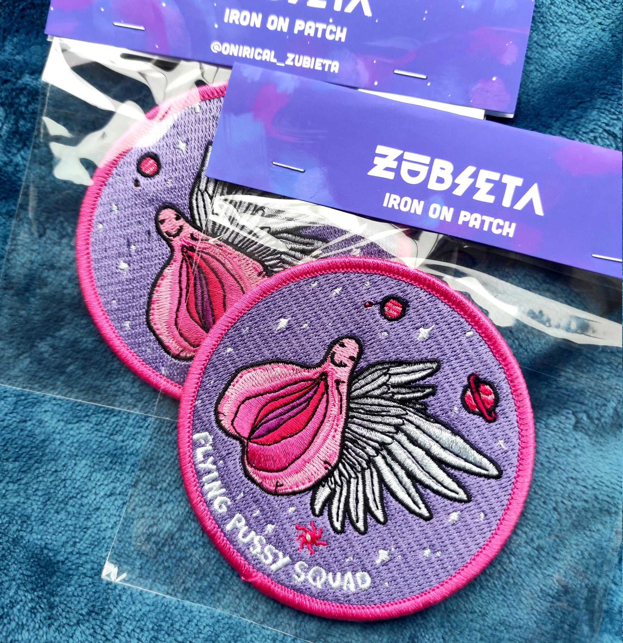 Flying Pussy Squad Embroidered Patch featuring psychedelic design in six colors, measuring 12.5cm x 12.5cm.