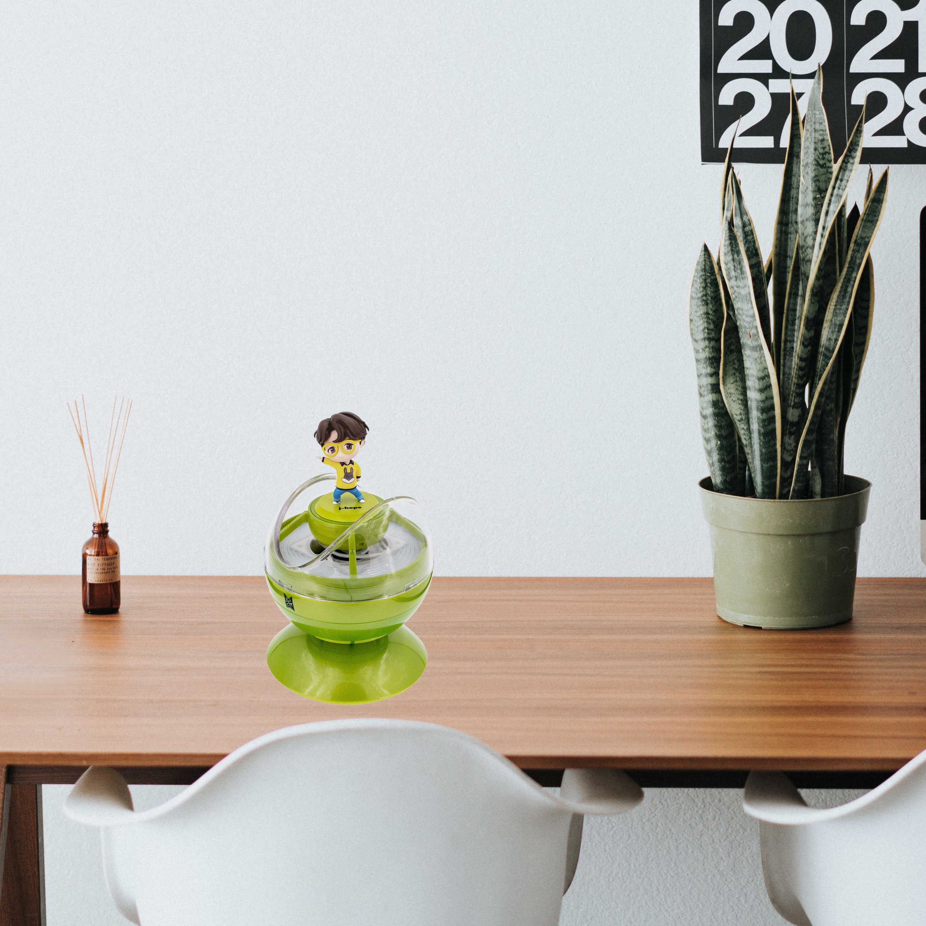 Desk with air purifier and plant