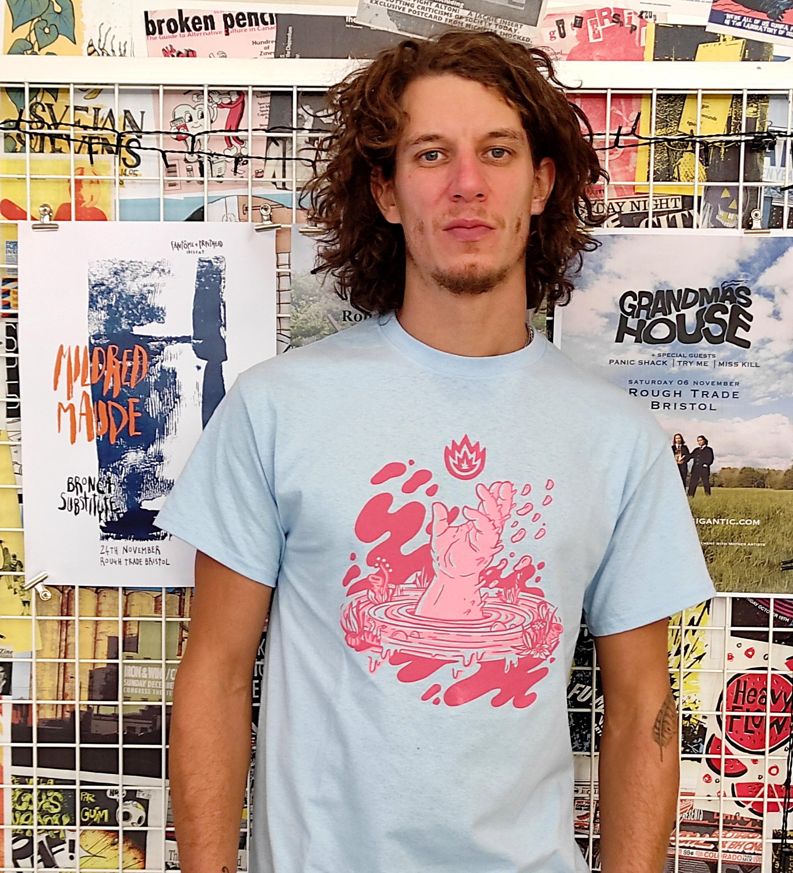 Limited edition We Came From The Water screen print t-shirt in baby blue with artistic front and back designs.