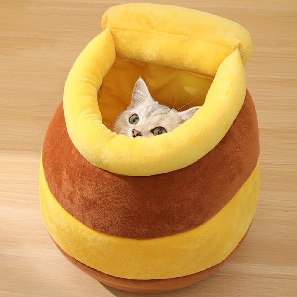 Adorable Honey Jar Theme Cat Bed featuring a plush honey jar design, perfect for cozy cat naps.