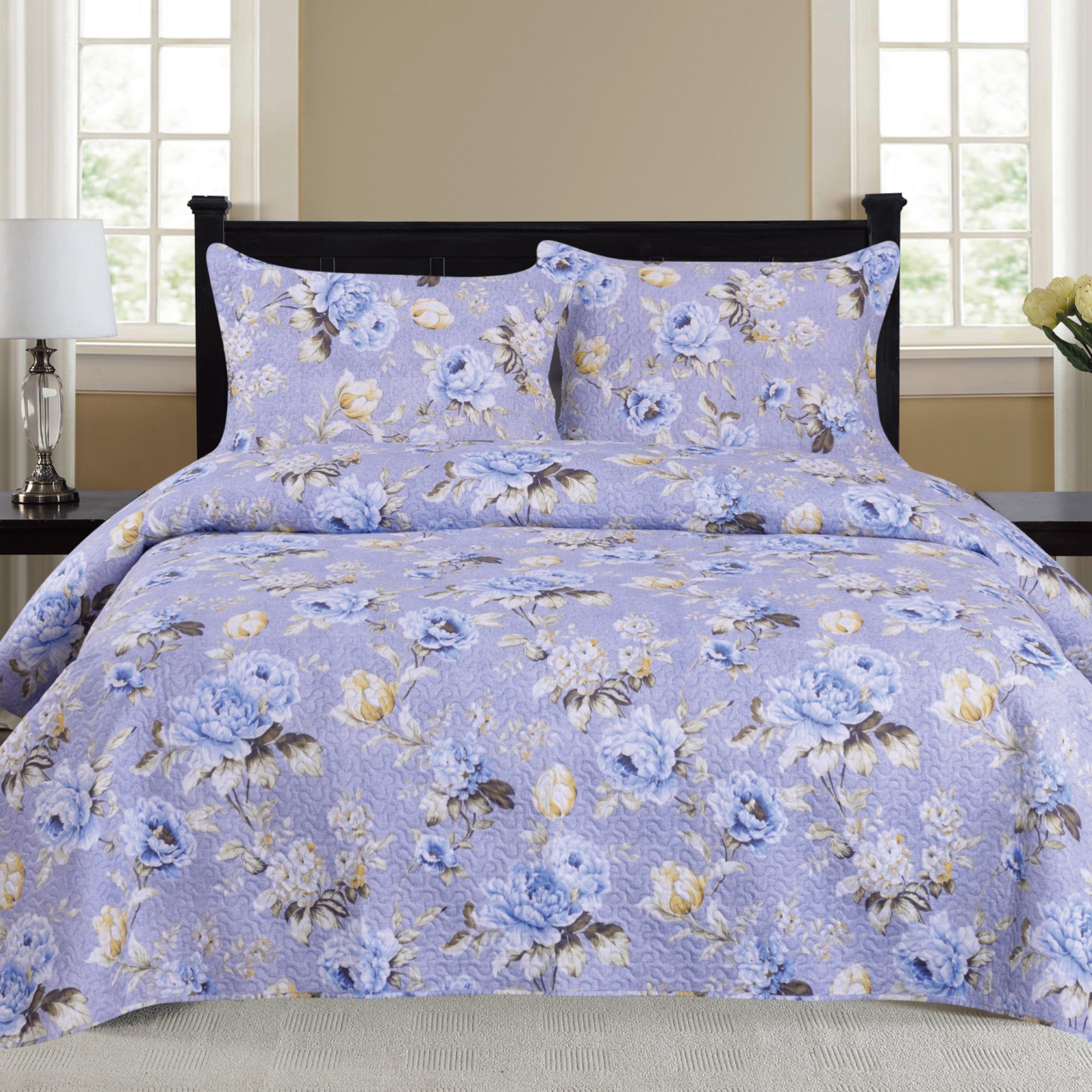 Nikki 3 Piece Quilt Set in Lilac featuring a soft quilt and matching pillow shams, elegantly styled for a cozy bedroom decor.