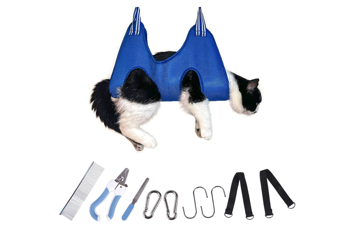 A comfortable 10 in 1 Pet Grooming Hammock designed for dogs and cats, featuring a double-layer fabric and essential grooming tools.