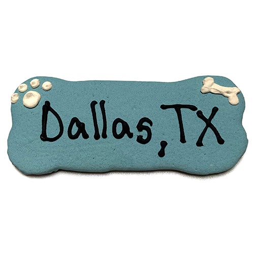 A pack of Custom Bones dog treats, personalized with text, featuring a yogurt coating and colorful vegetable coloring, perfect for dogs.