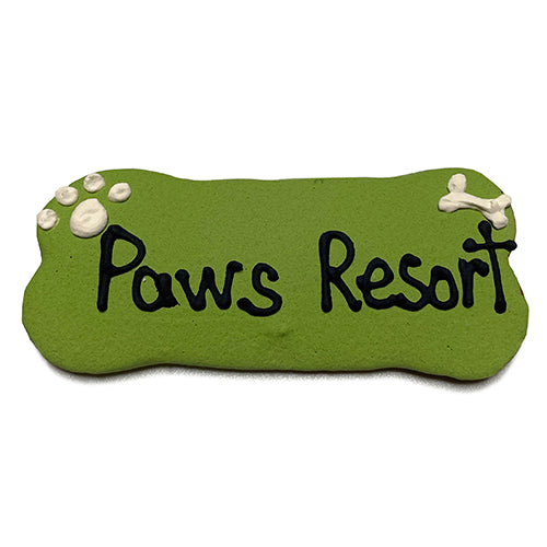 A pack of Custom Bones dog treats, personalized with text, featuring a yogurt coating and colorful vegetable coloring, perfect for dogs.