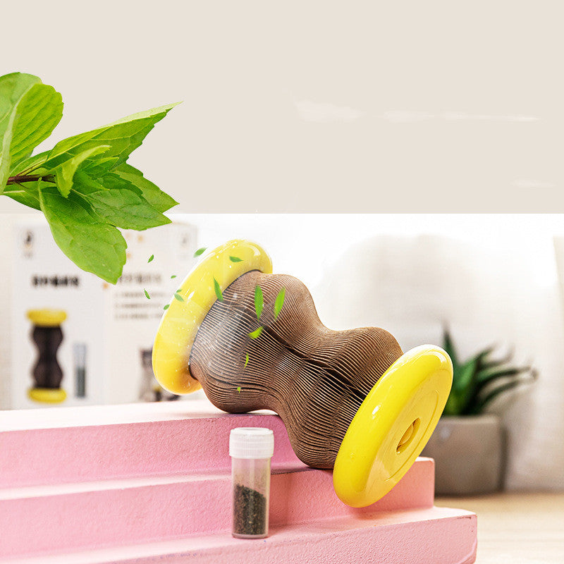 A colorful Pet Toy Magic Organ Corrugated Paper Wheel designed for cats, featuring a durable construction of TPR, ABS, and corrugated paper, ideal for scratching and playing.