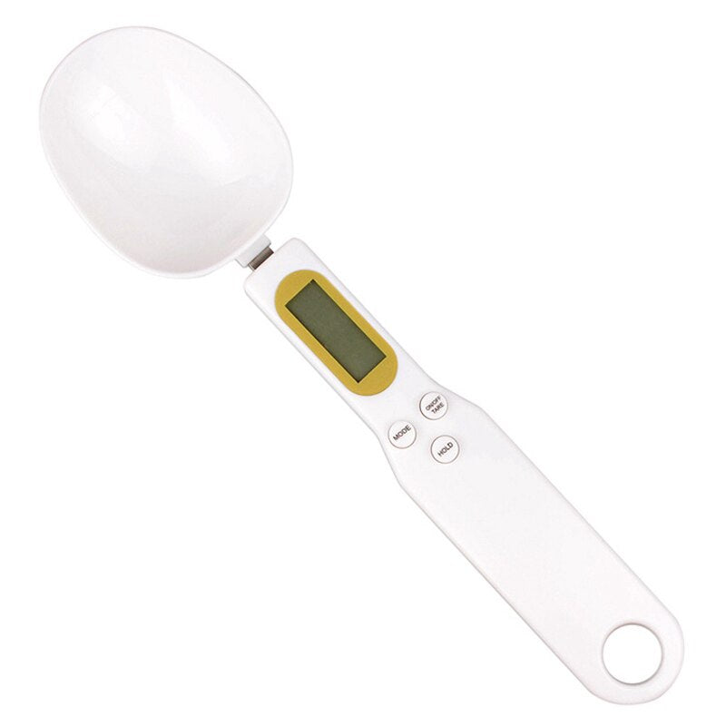 A digital kitchen measuring spoon with an LCD display, showcasing its sleek design and detachable scoop for easy cleaning.