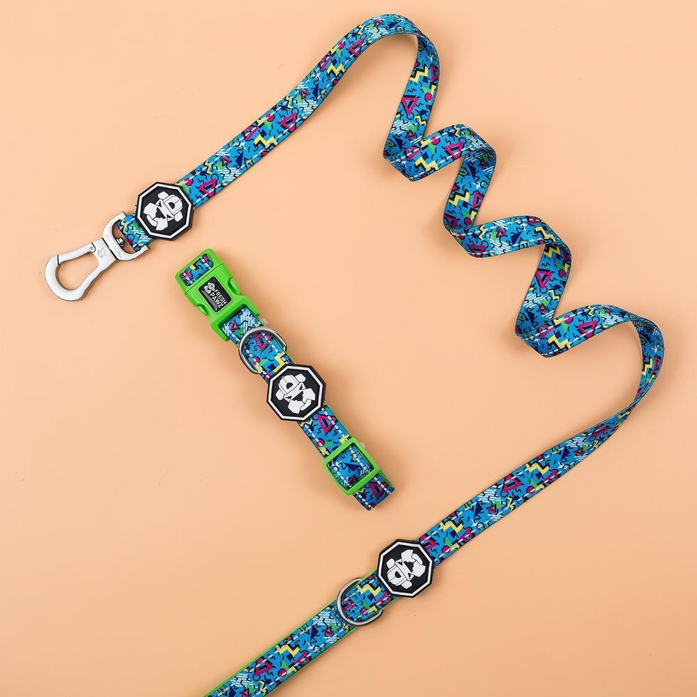 A colorful 90s Throwback dog collar featuring neoprene padding and a branded buckle, designed for comfort and style.